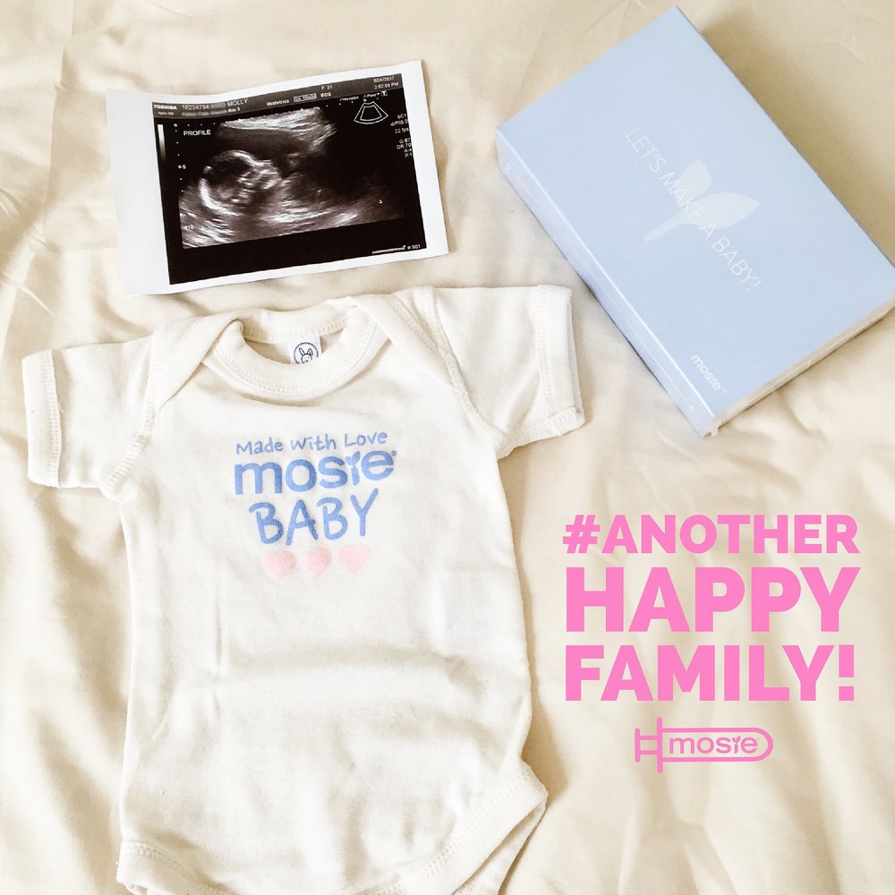 A sonogram with a mosie baby kit and onesie