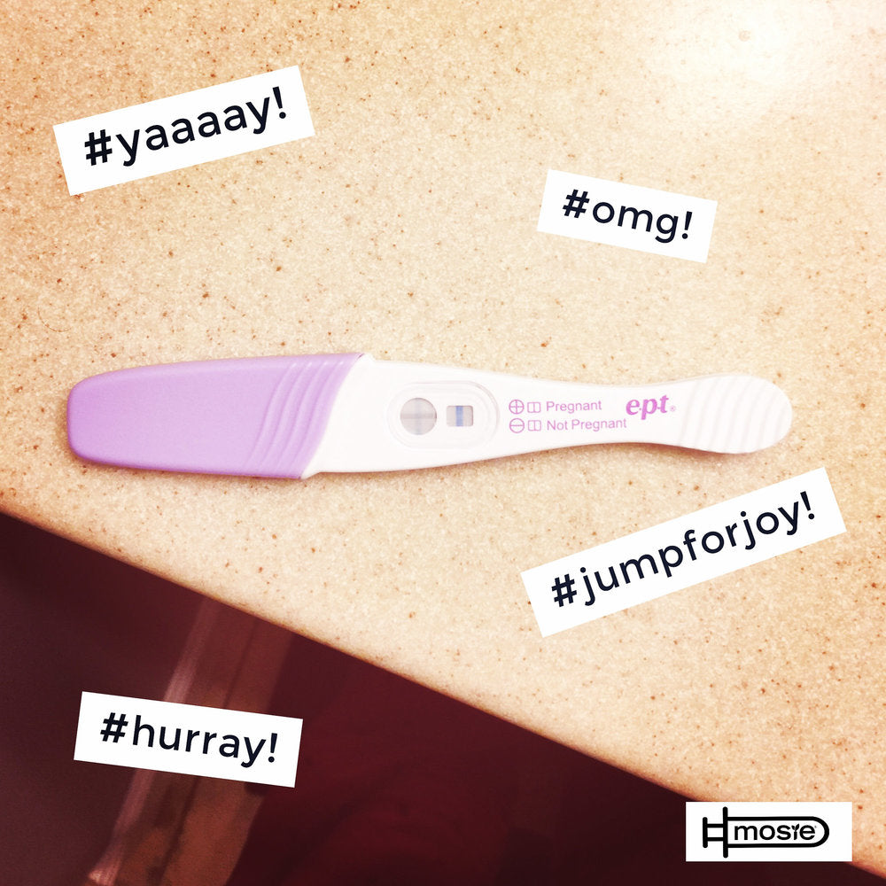 positive pregnancy test of a Mosie user with hashtags around it reading #omg and #hurray